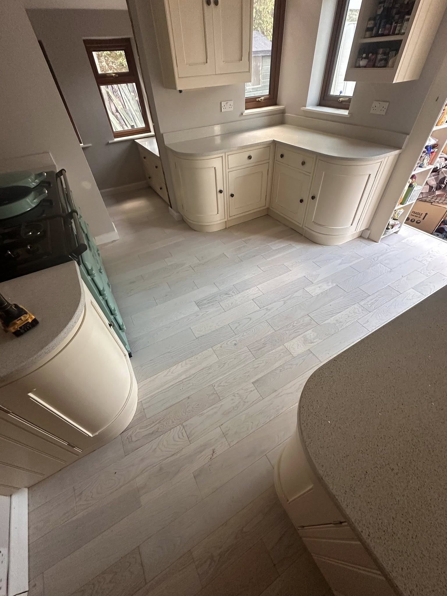 Curved cream fitted kitchen Hillsborough | Crosspool